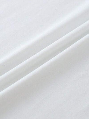 a close up view of a white fabric