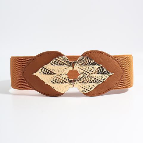 a brown belt with a gold bow on it