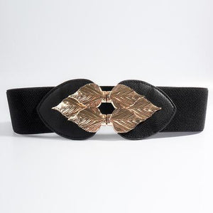 a black belt with a gold leaf buckle