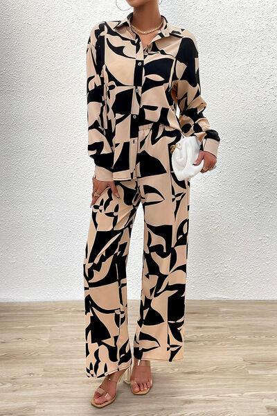 a woman in a black and white print jumpsuit