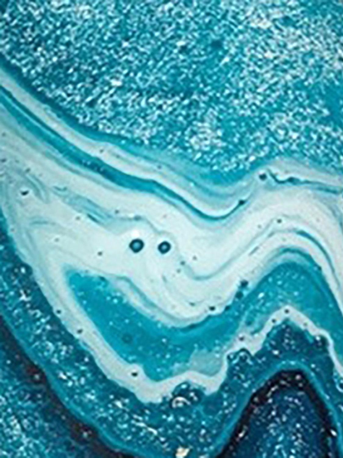 a blue and white liquid painting on a white background