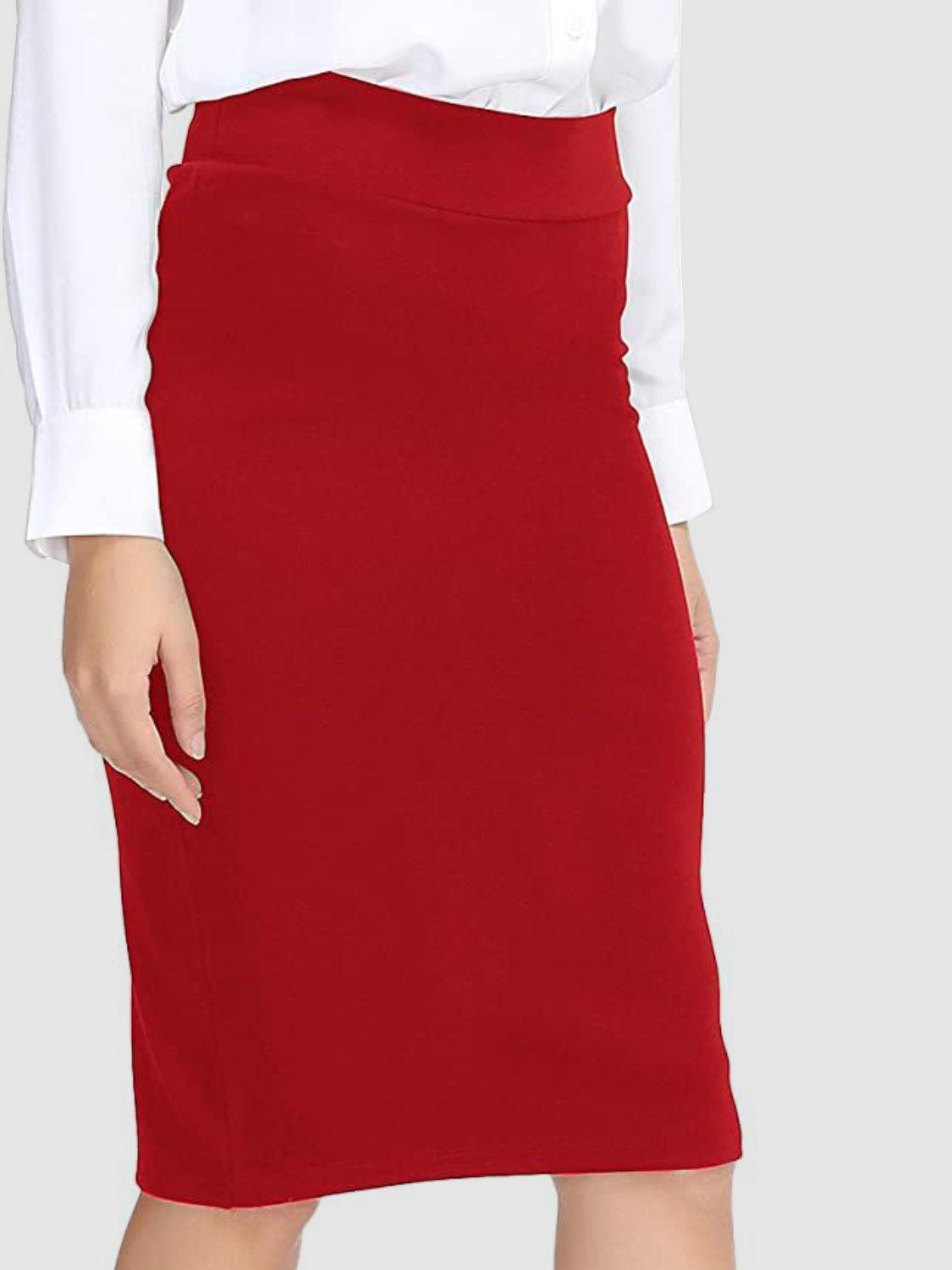 a woman in a white shirt and red skirt