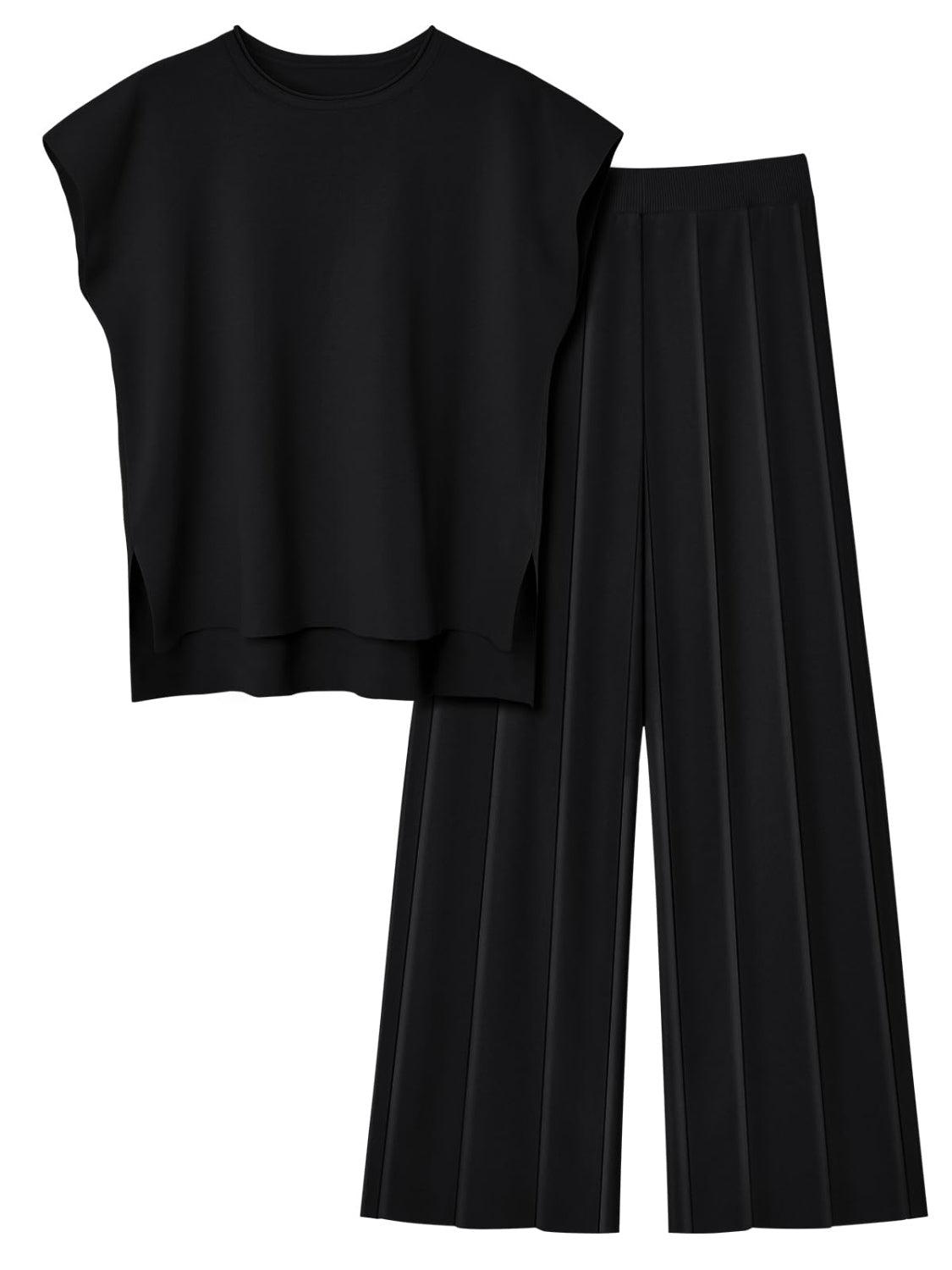 a black crop top and pleated pants