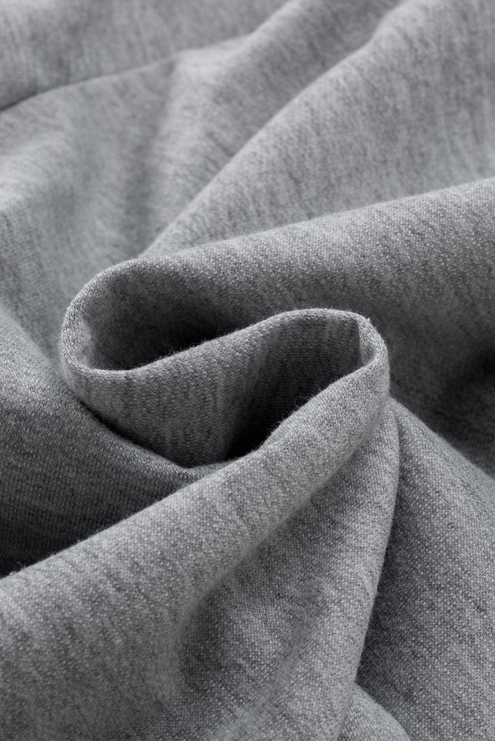 a close up view of a grey fabric