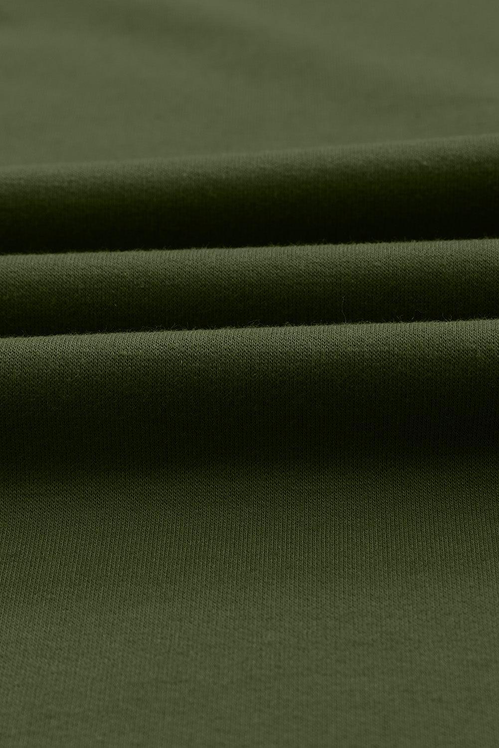 a close up of a plain green fabric