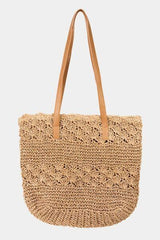 a straw bag with a leather handle