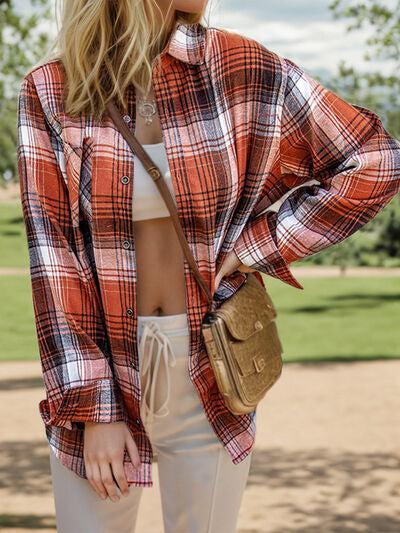 a woman wearing a plaid shirt and white pants