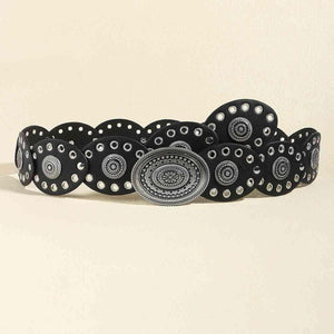 a black and white belt with circles on it