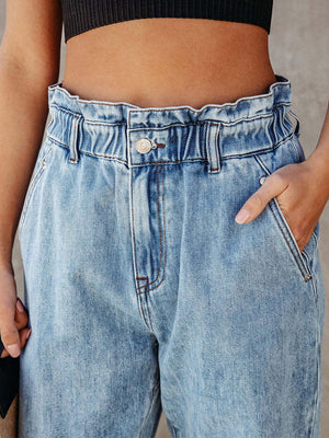 a close up of a person wearing a pair of jeans