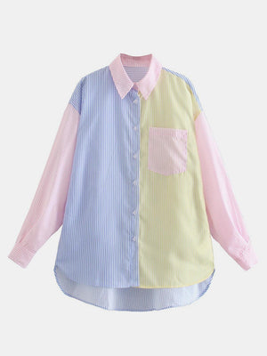 a blue and yellow shirt with a pink collar