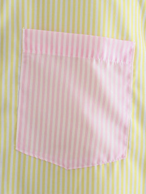 a pink and yellow striped shirt with a pocket