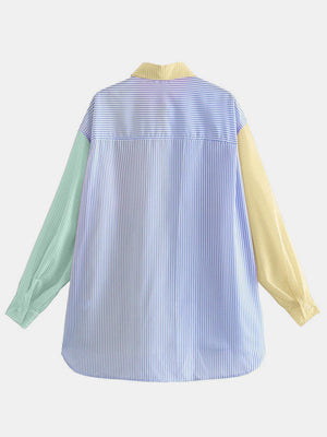 a blue and white striped shirt with yellow sleeves