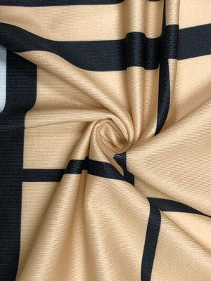 a close up of a black and beige fabric