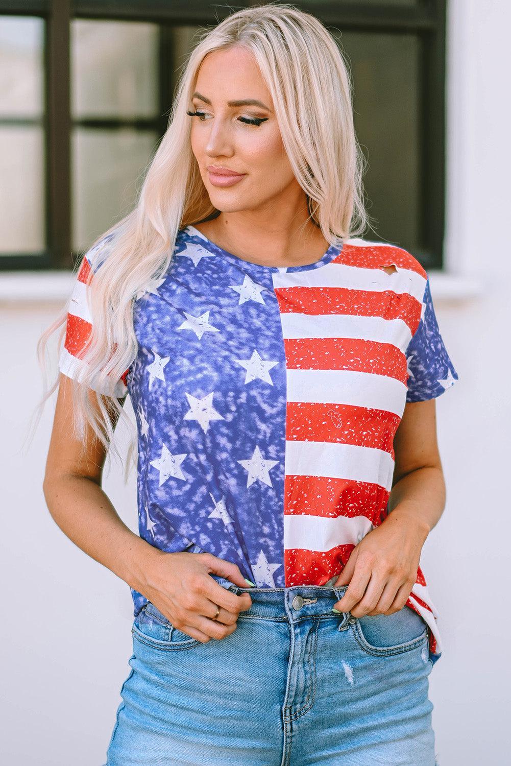 a woman with blonde hair wearing an american flag t - shirt