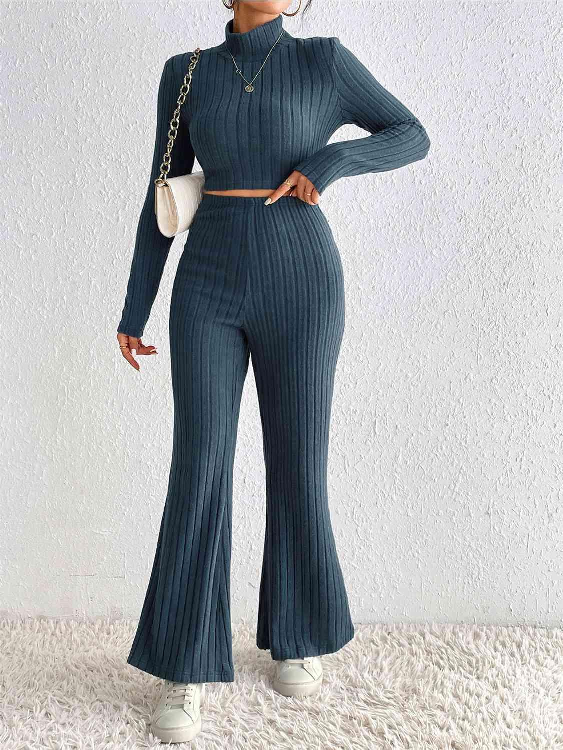 a woman wearing a blue rib knit set