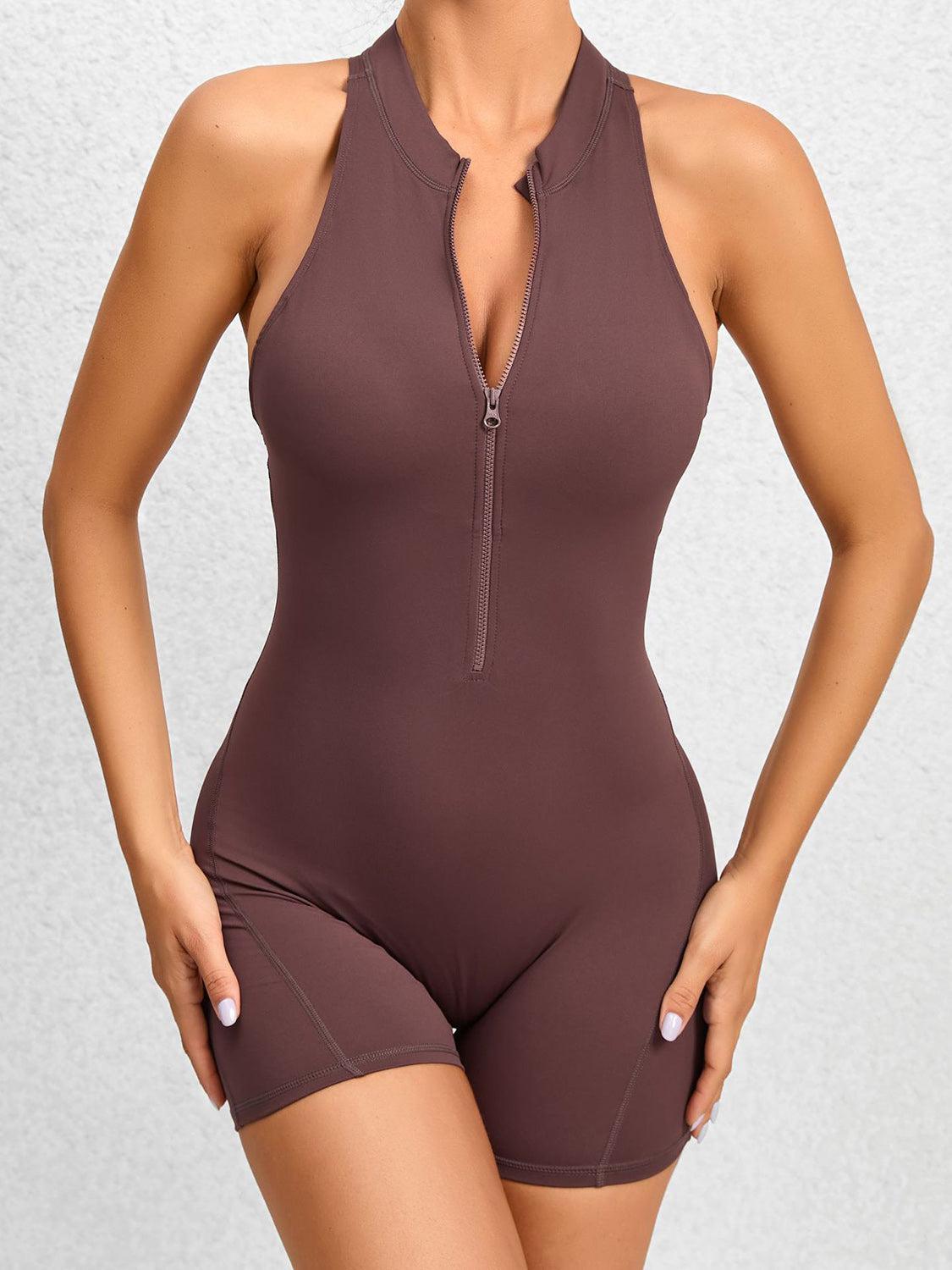 a woman wearing a bodysuit with a zipper