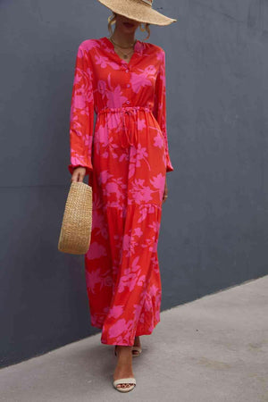 a woman in a red dress and straw hat