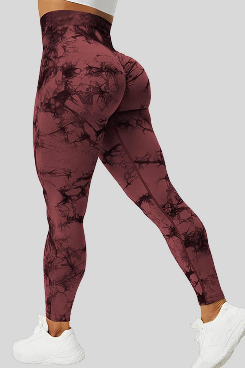 a woman's leggings with a black and red pattern