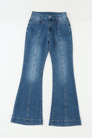 a pair of blue jeans on a white background