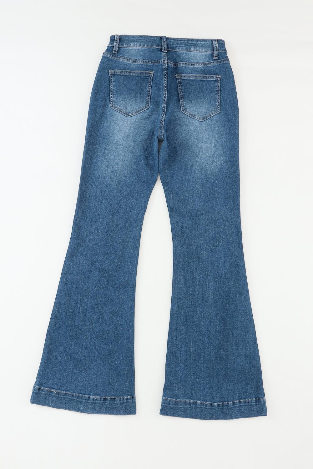 a pair of blue jeans on a white background