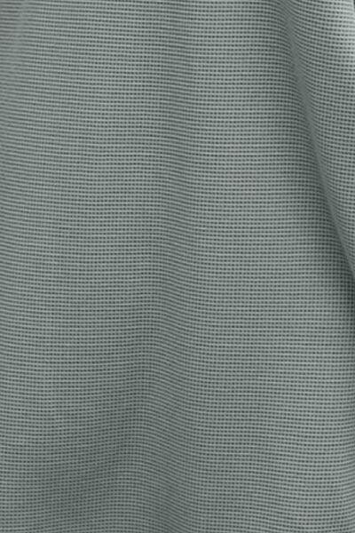 a close up view of a grey fabric