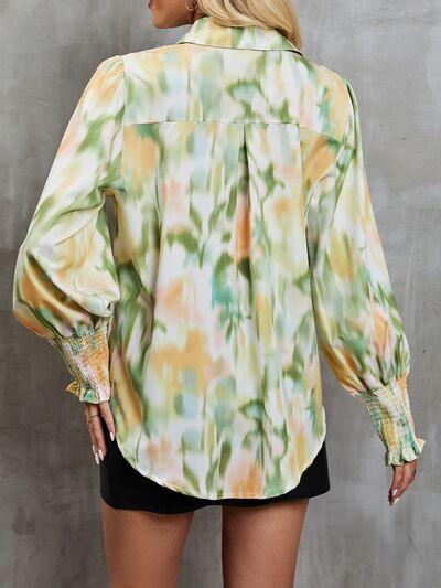 a woman wearing a green and yellow tie dye shirt