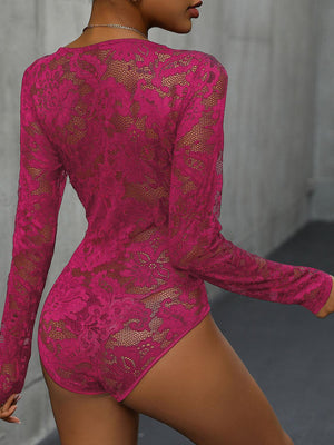 a woman in a pink lacy bodysuit