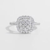 a white gold ring with a cluster of diamonds