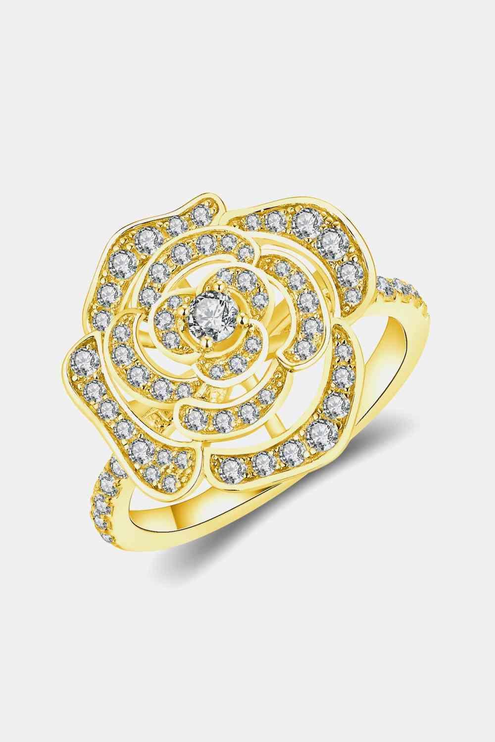 a yellow gold ring with diamonds on it