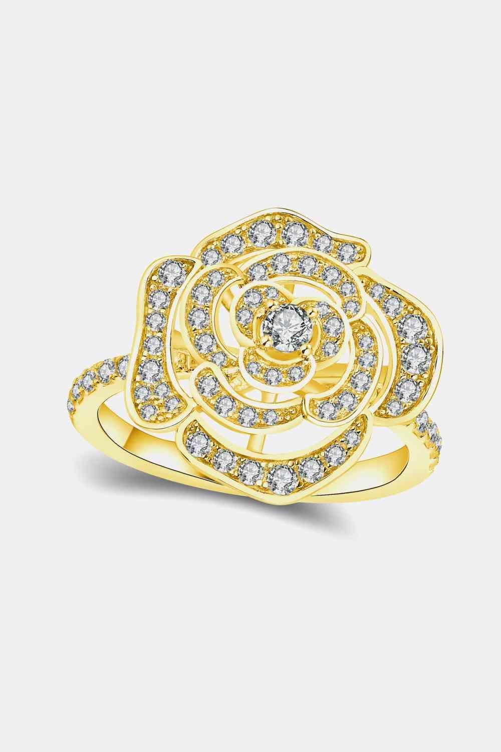 a yellow gold ring with diamonds on it