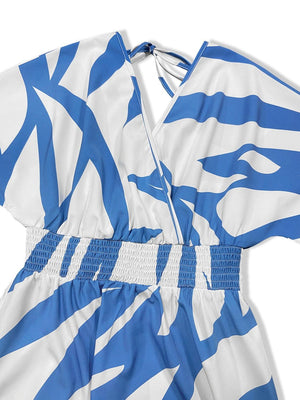 a white and blue dress with a blue and white pattern