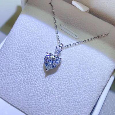 a heart shaped necklace in a box