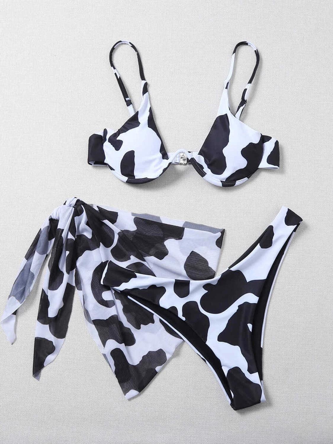 a bikini top with a cow print on it