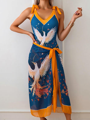 a woman wearing a dress with a bird on it