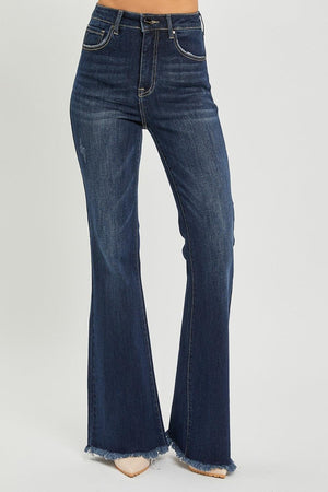 a woman is wearing a pair of jeans