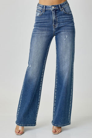 a woman is wearing a pair of jeans