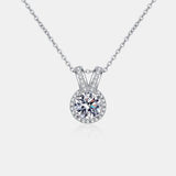 a necklace with a round diamond in the center