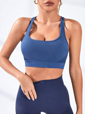 a woman wearing a blue sports bra top