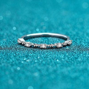a close up of a ring on a blue surface