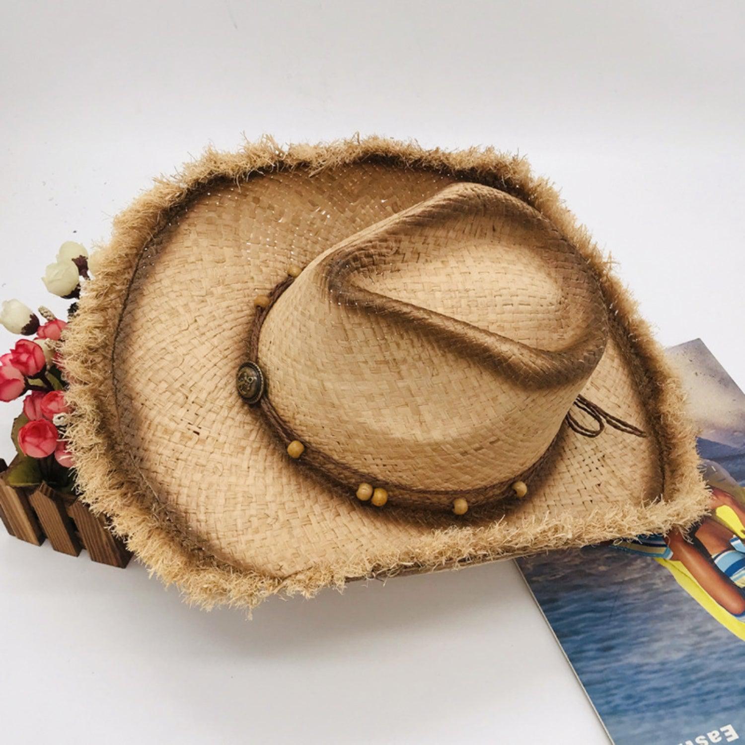 a straw hat on top of a magazine