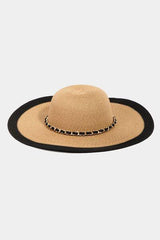 a straw hat with a chain around the brim