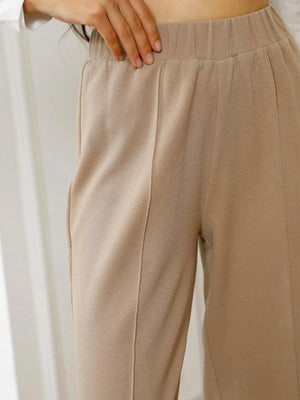 a close up of a person wearing a pair of pants