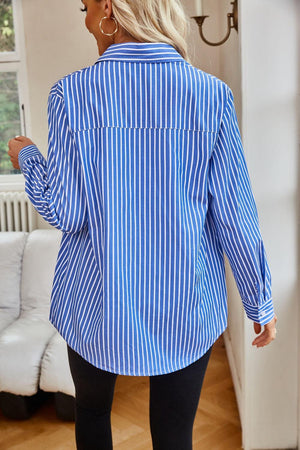 a woman wearing a blue and white striped shirt