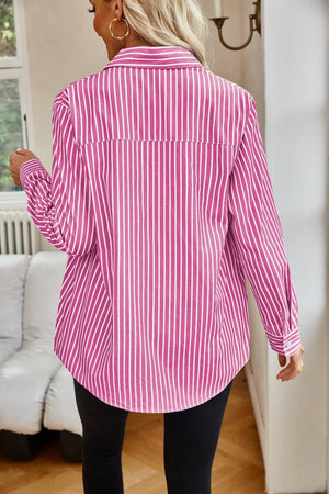 a woman wearing a pink and white striped shirt