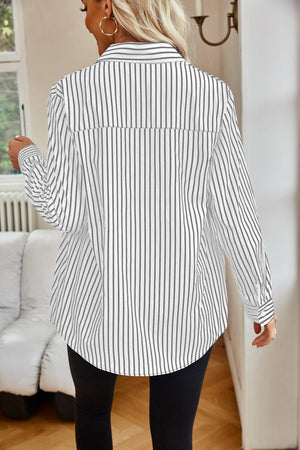 a woman in black and white striped shirt and leggings