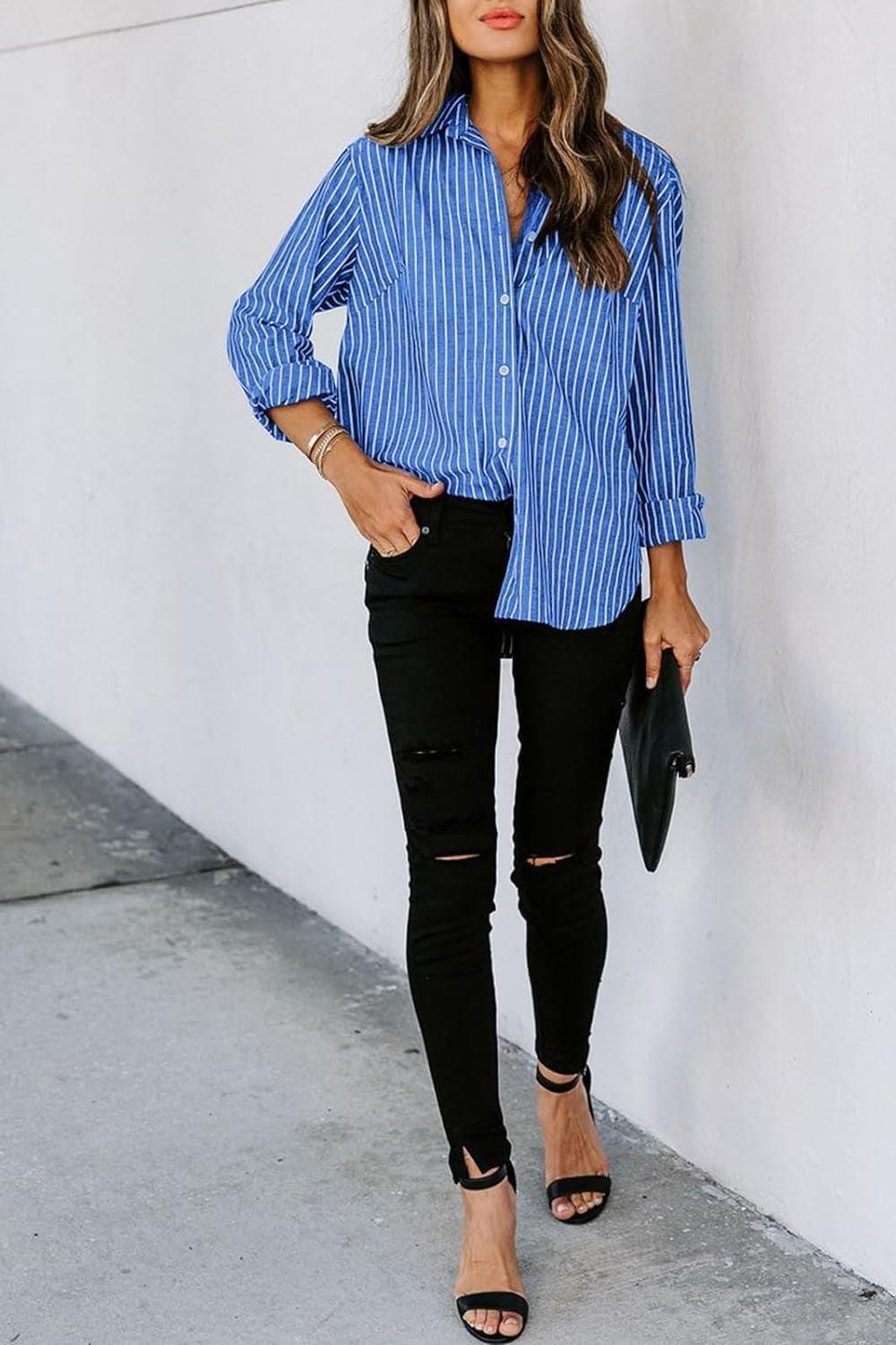 a woman wearing a blue striped shirt and black ripped jeans