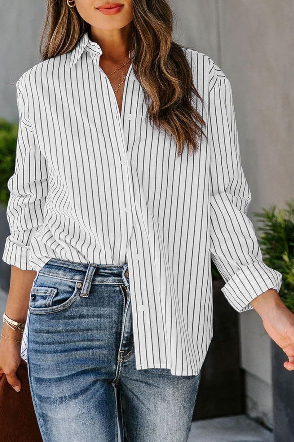 a woman wearing a white and black striped shirt