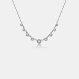 a diamond necklace on a white background