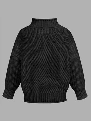 a black sweater on a gray background