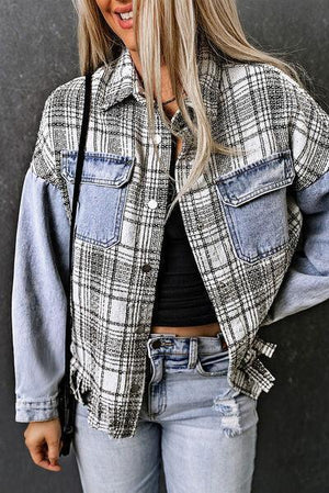 a woman with blonde hair wearing a jacket and jeans